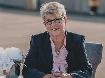 Headshot of Renee Heiney, plastic broker.